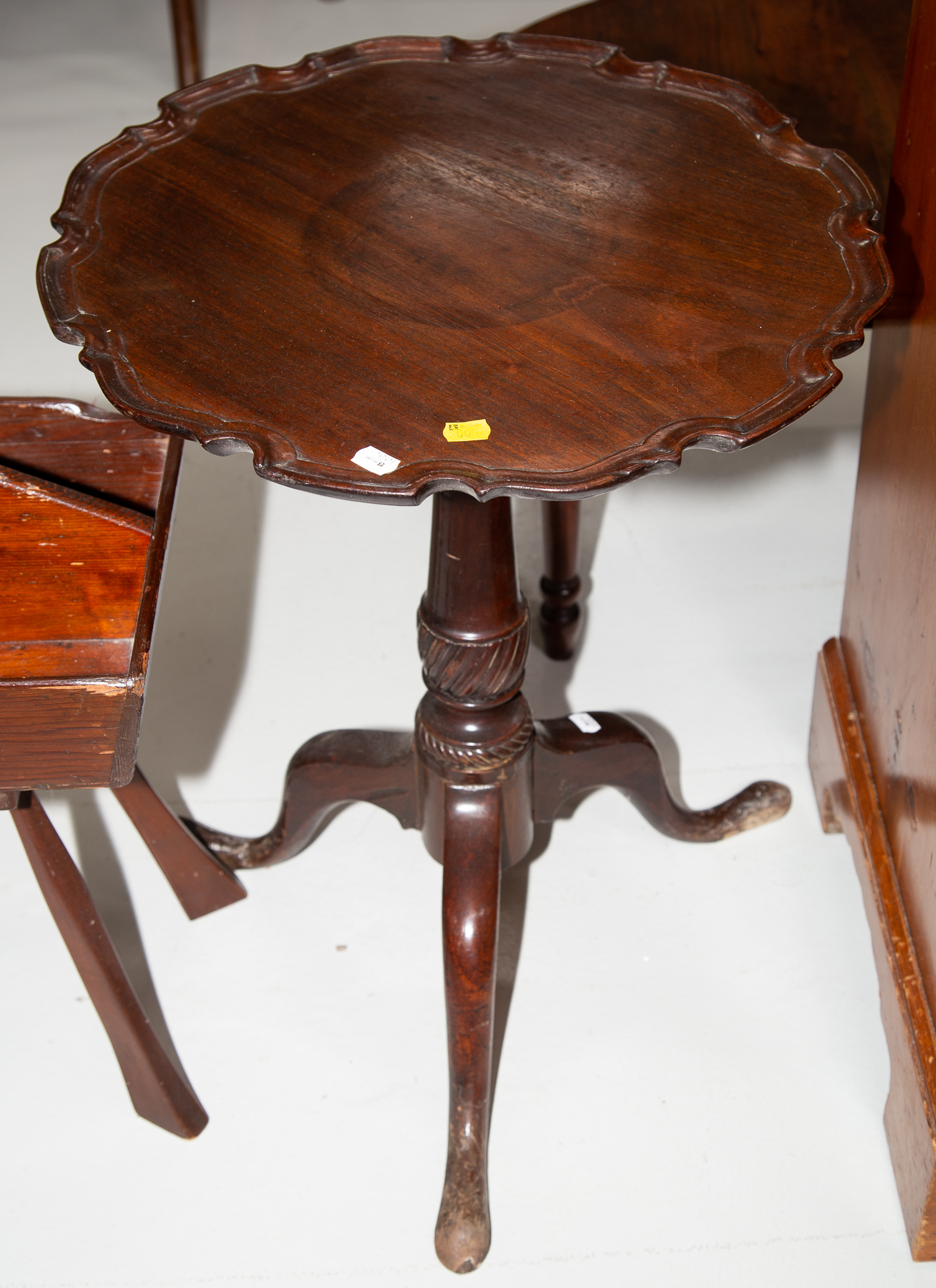 Appraisal: CHIPPENDALE STYLE MAHOGANY CANDLE STAND Bench-made early th century in