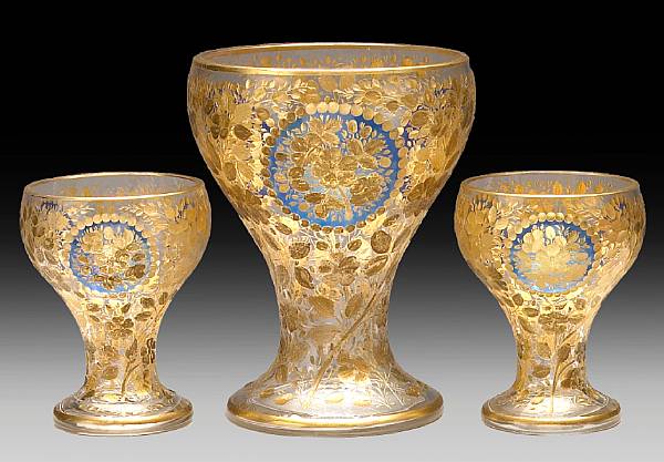 Appraisal: A suite of three acid etched and gilt heightened vases