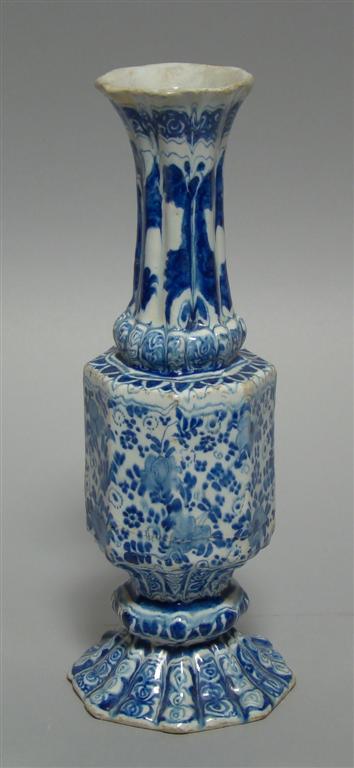 Appraisal: DELFT BLUE AND WHITE OCTAGONAL VASE th century with gadrooned