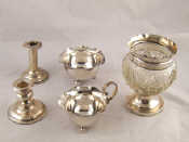 Appraisal: A mixed lot being a silver dwarf candlestick and a