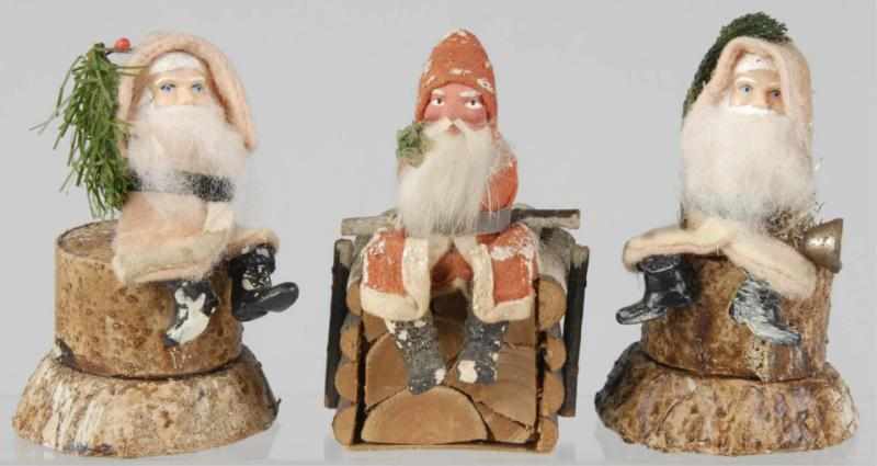 Appraisal: Lot of Christmas Santa Candy Containers Description Includes one circa