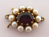 Appraisal: A carat gold cultured pearl and garnet clasp the central