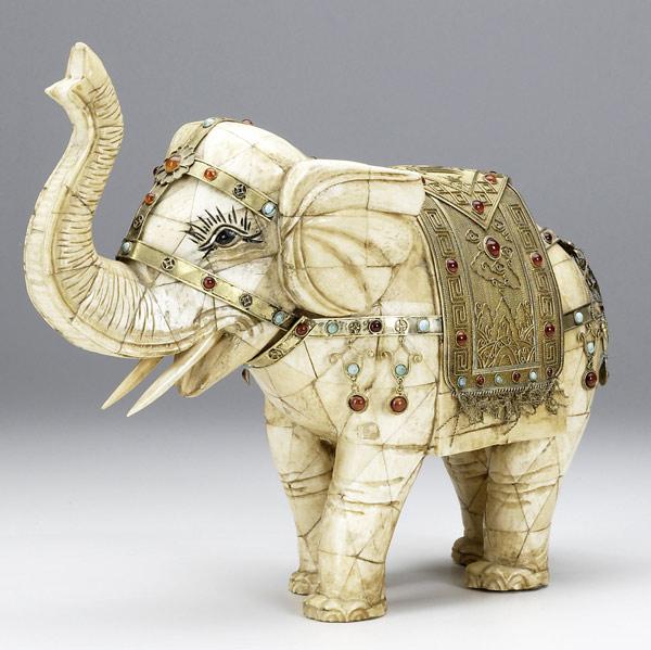 Appraisal: Asian jeweled Ivory or bone elephant th C With brass