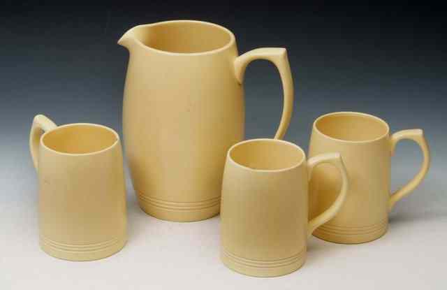 Appraisal: Keith Murray - for WedgwoodA matt straw lemonade set comprising