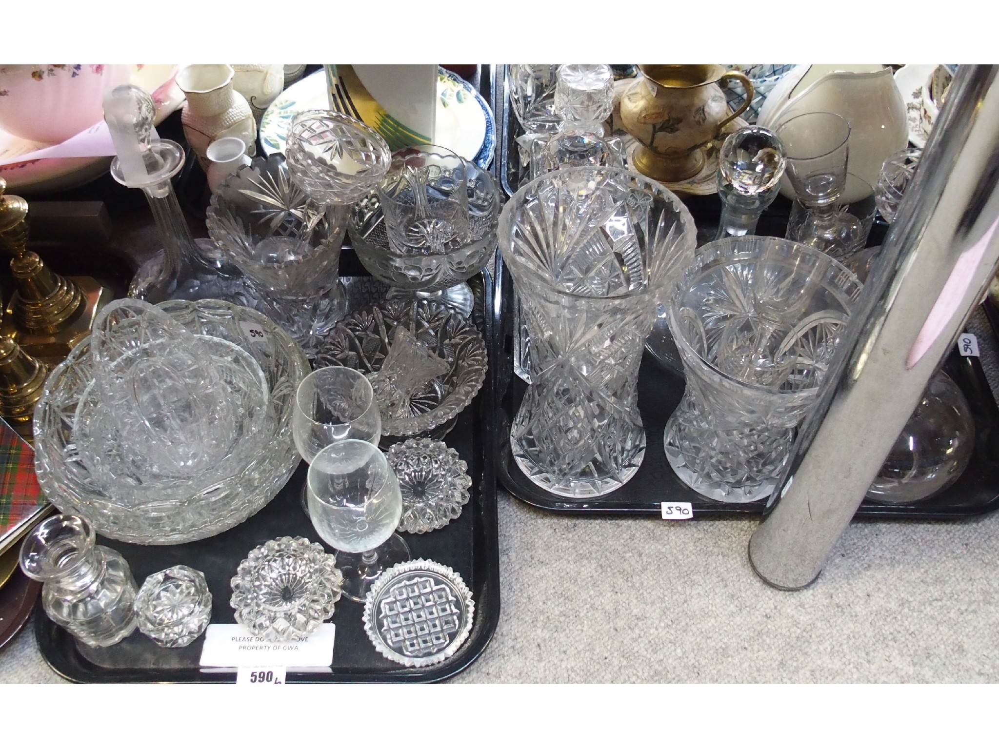 Appraisal: Two trays comprising various cut glass including decanters centrebowls vases