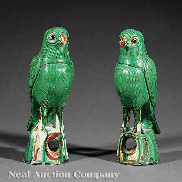 Appraisal: A Pair of Chinese Sancai Glazed Birds each rendered atop