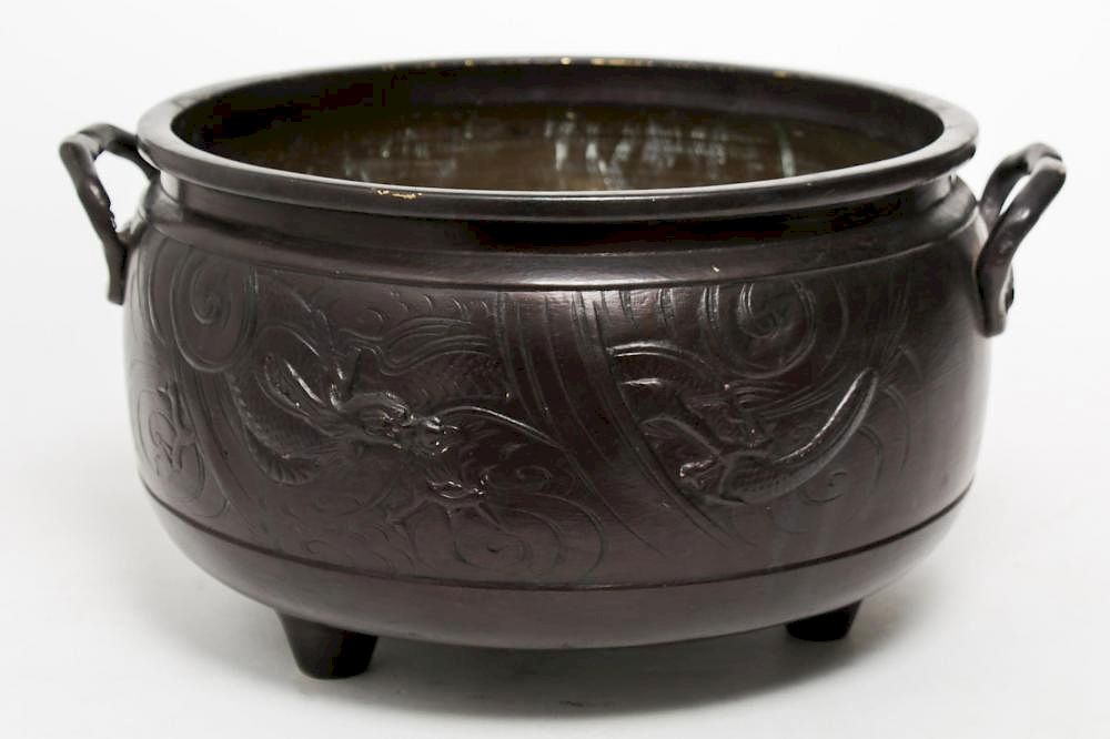 Appraisal: Japanese Bronzed Metal Dragons Jardiniere Vintage Japanese bronzed metal jardiniere