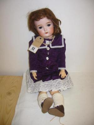 Appraisal: A Kammer Reinhardt bisque head doll with brown lashed sleeping