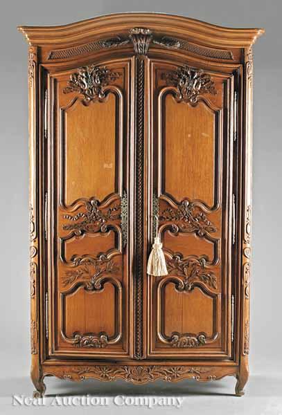 Appraisal: A French Provincial Carved Oak Armoire late th early th