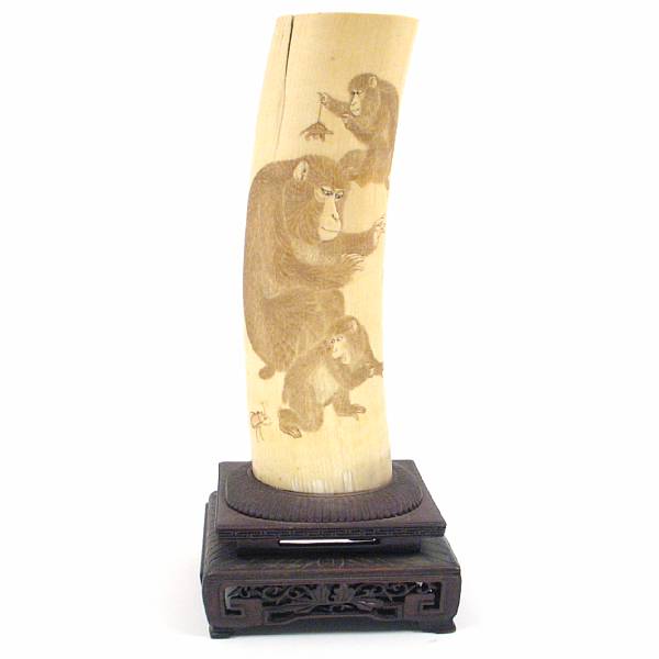 Appraisal: An Ivory tusk with carved monkey height in width in