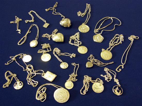 Appraisal: Twenty silver pendants and lockets on silver and white metal