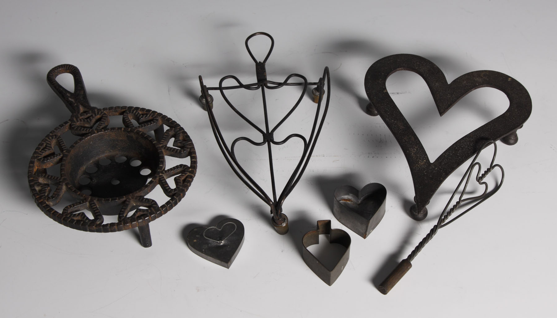 Appraisal: Heart Shaped Wrought Iron Metal Ware Tirivet iron holder small