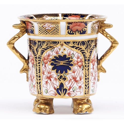 Appraisal: A Royal Crown Derby Imari pattern vase on four gilt