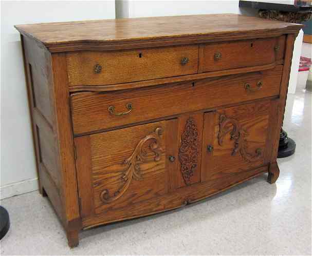 Appraisal: LATE VICTORIAN OAK BUFFET American c having three drawers over