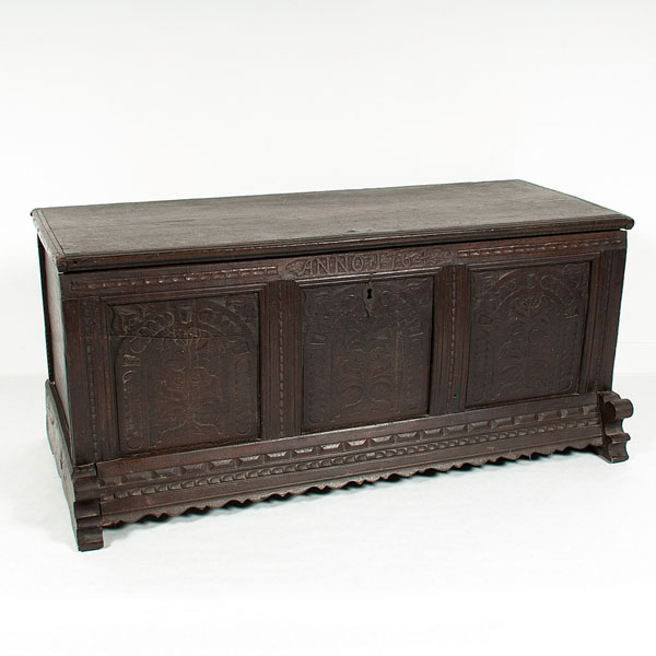 Appraisal: English th century A beautifully carved oak blanket chest having