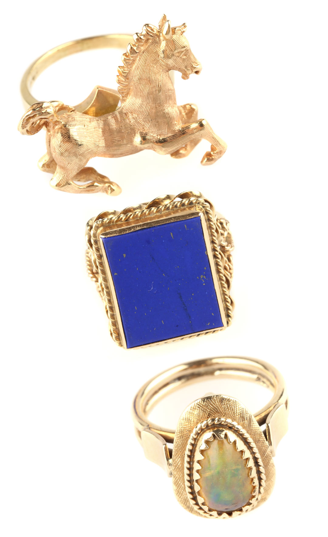 Appraisal: Three Lady's Rings K horse motif ring size Wt g