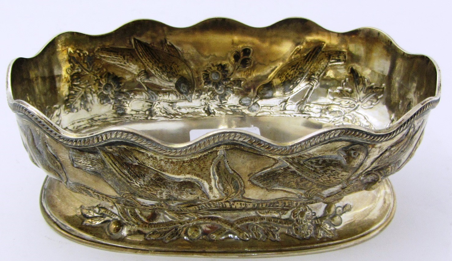 Appraisal: A Victorian silver bowl of shallow oval form decorated with