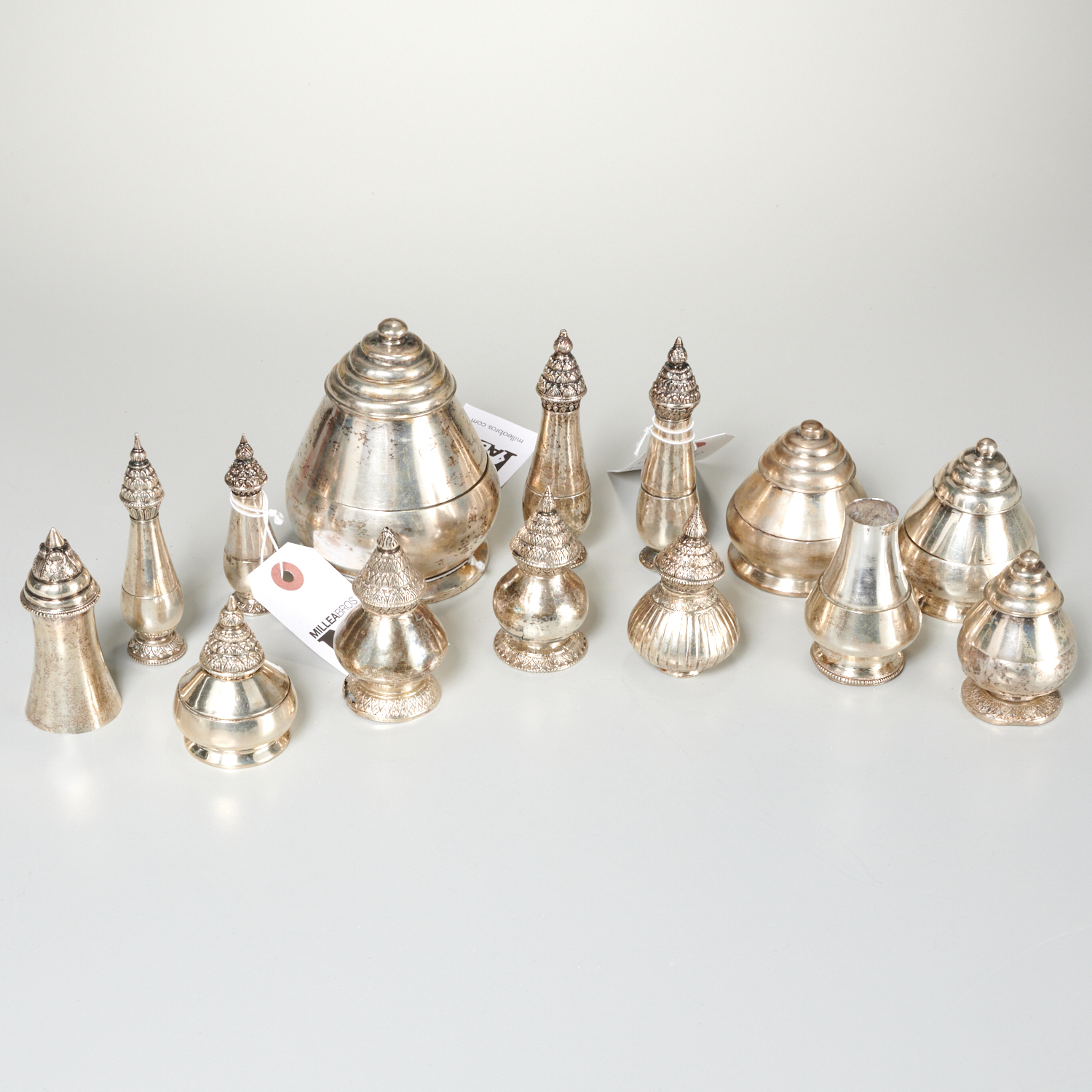 Appraisal: THAI SILVER BOTTLES AND JARLETS th th c Northern Thailand