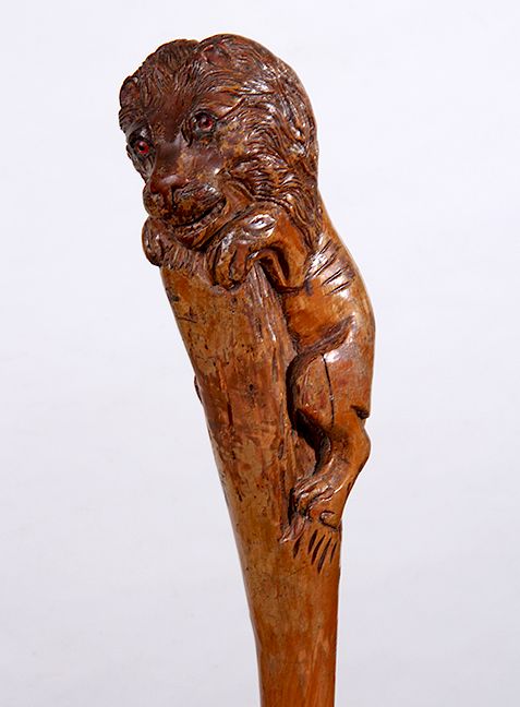 Appraisal: Folk Art Lion Cane Ca - An x carved lion