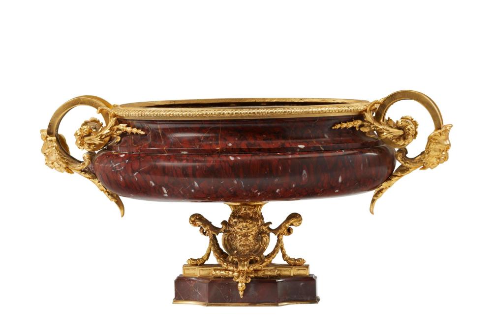 Appraisal: A gilt-bronze and marble centerpiece Late th Early th Century