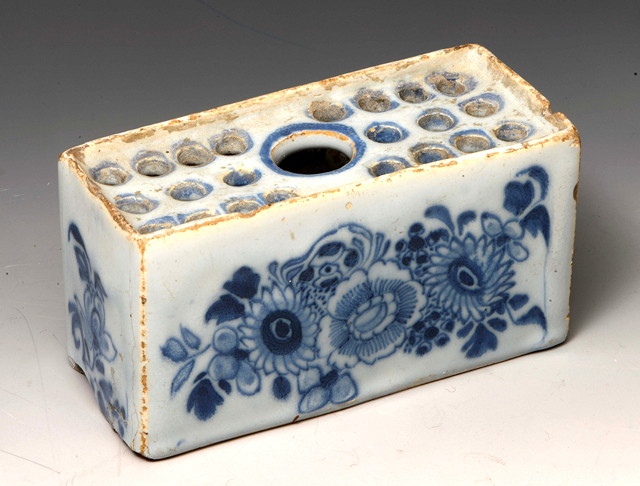 Appraisal: A MID TO LATE ENGLISH DELFT WARE FLOWER BRICK decorated