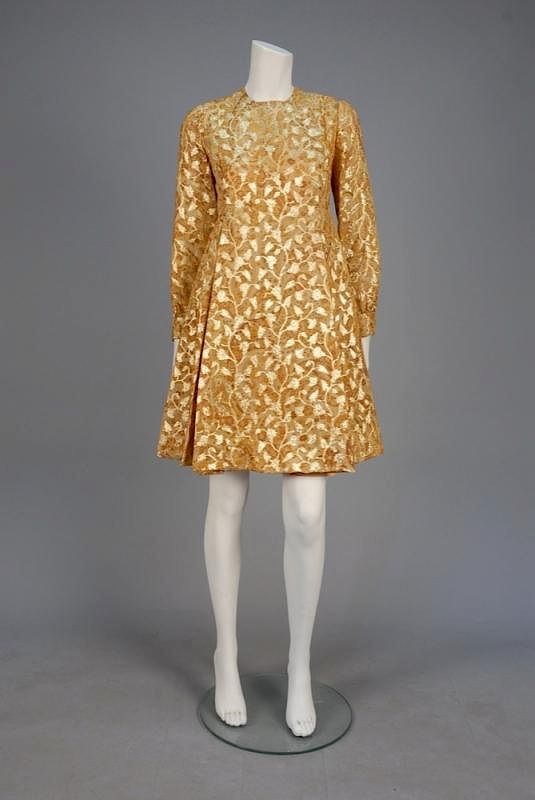 Appraisal: METALLIC BROCADE COCKTAIL DRESS s Pale gold chiffon printed with