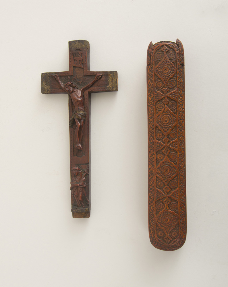 Appraisal: RELIEF-CARVED FRUITWOOD PEN CASE AND A CARVED WALNUT CRUCIFIX The