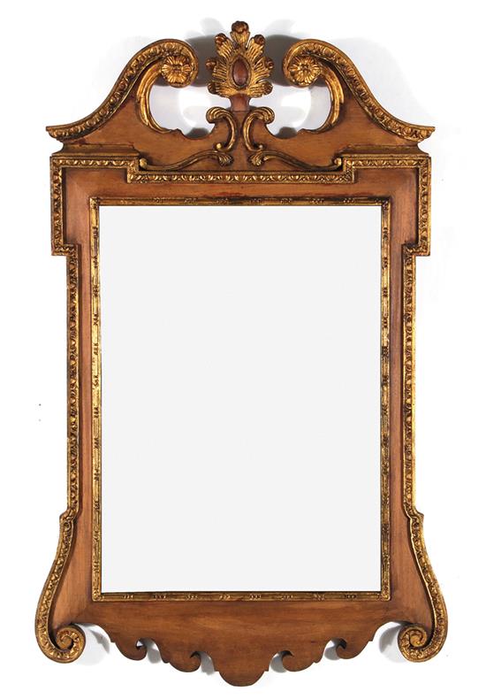 Appraisal: Georgian style parcel-gilt mahogany mirror with broken crown H W