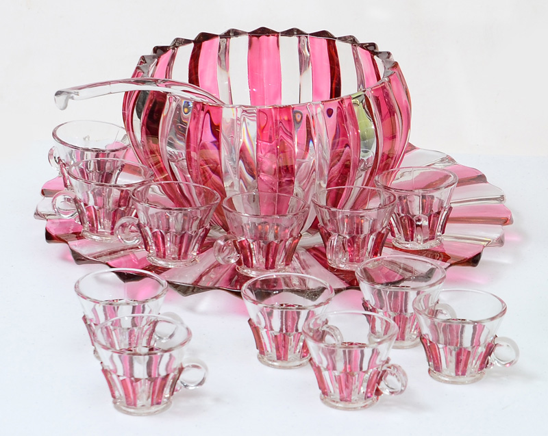 Appraisal: CRANBERRY STRIPED PUNCH BOWL SET Flashed cranberry stripes on alternating