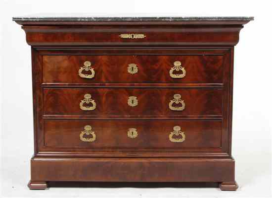 Appraisal: An Empire Style Mahogany Chest of Drawers having a rectangular