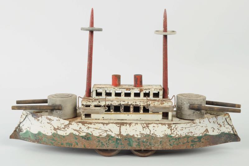 Appraisal: Scheible Tin Friction Toy Battleship Has moderate to heavy wear