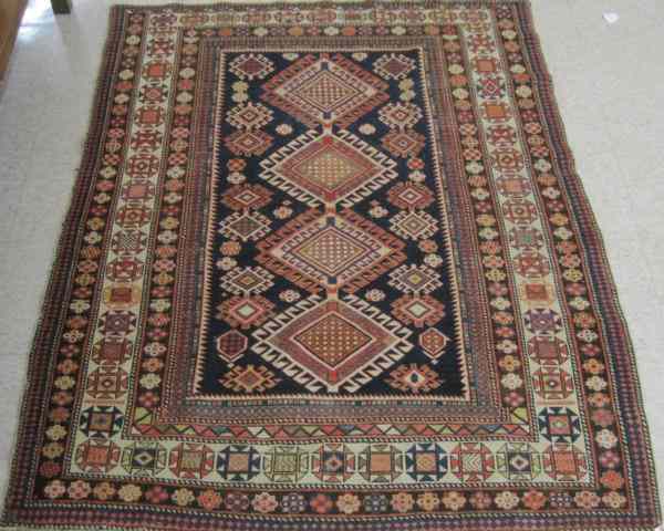 Appraisal: SEMI-ANTIQUE CAUCASIAN SHIRVAN AREA RUG c - overall geometric design