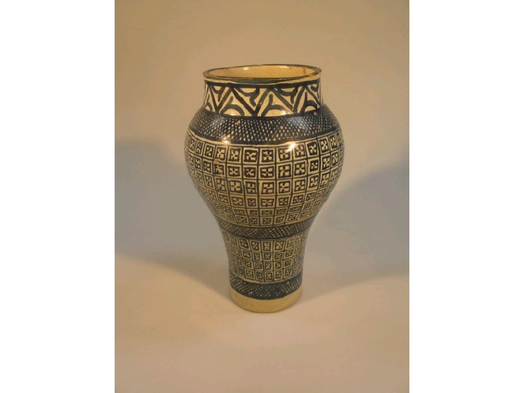 Appraisal: A Persian blue and white inverted baluster vase cm high