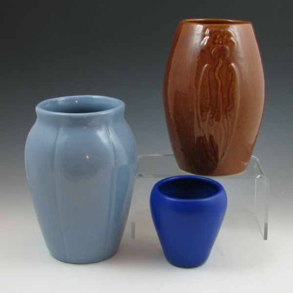 Appraisal: Three Zanesville Stoneware vases The two blue vases are marked