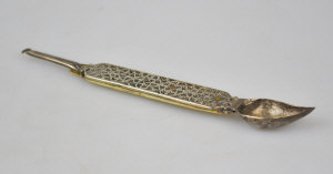 Appraisal: A th century Indian silver ear-cleaning implement the pierced handle