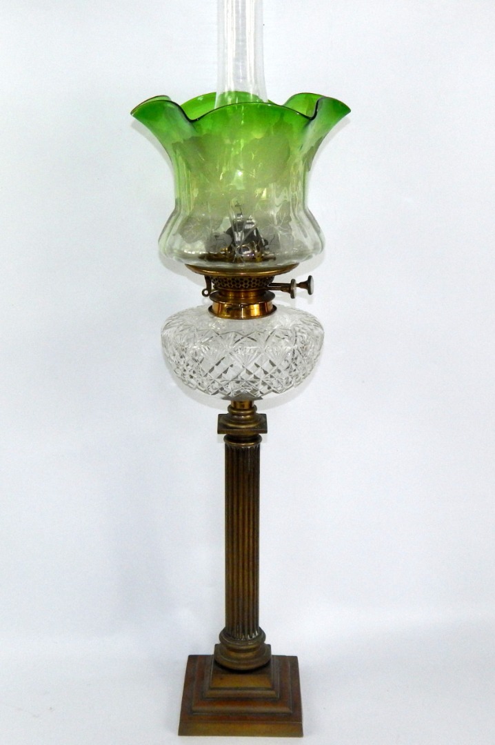 Appraisal: A W H Money brass column oil lamp with a