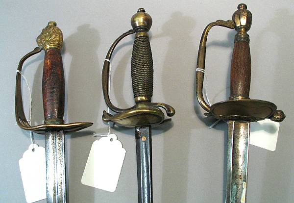 Appraisal: A lot of three th century swords Comprising British Pattern