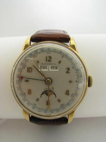 Appraisal: Vintage k yellow gold wristwatch with triple date moon phase