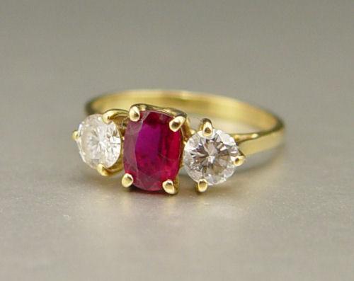 Appraisal: k RUBY DIAMOND STONE RING K yellow gold ring contains