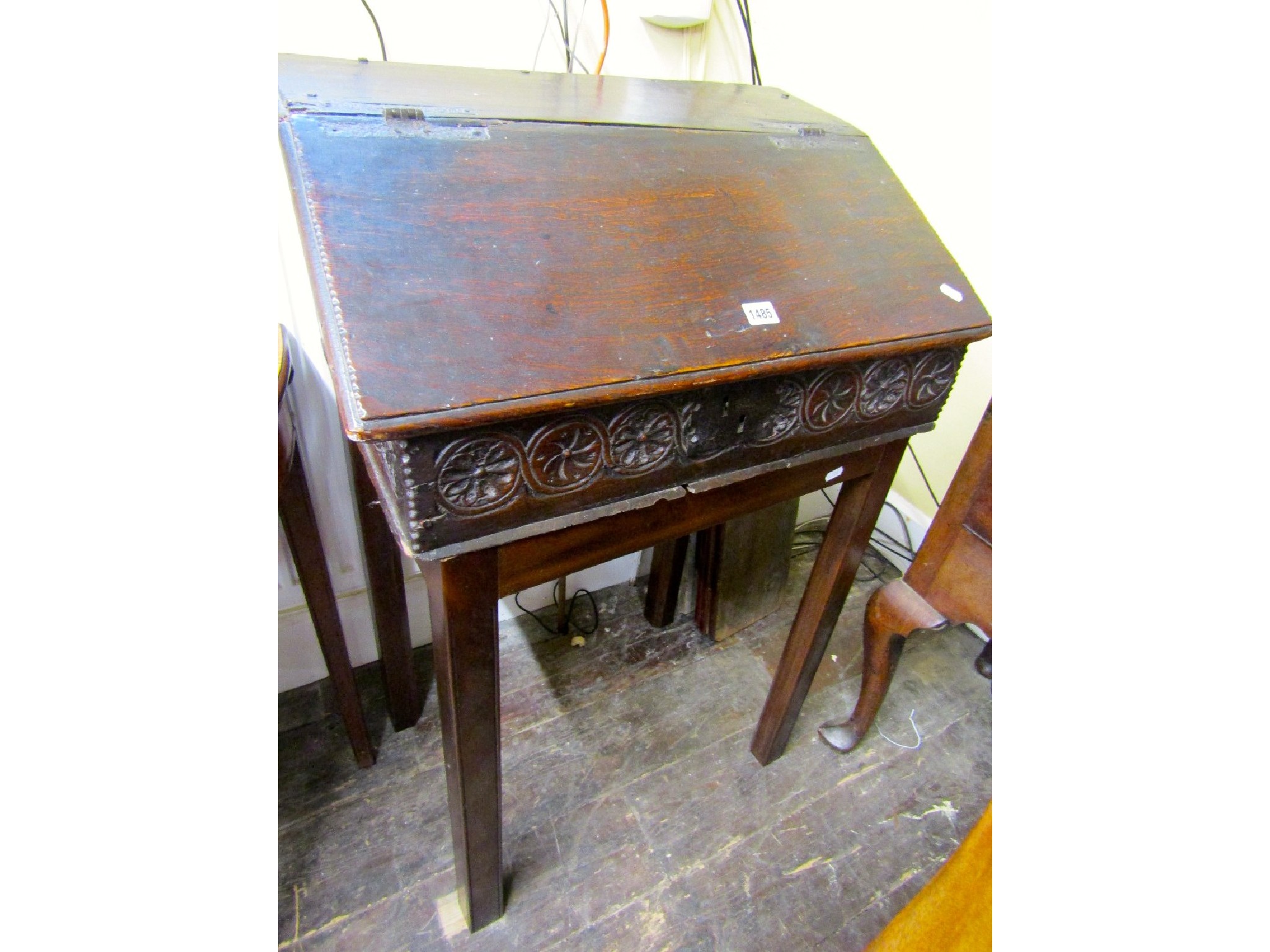 Appraisal: An early th century oak writing slope with hinged cover