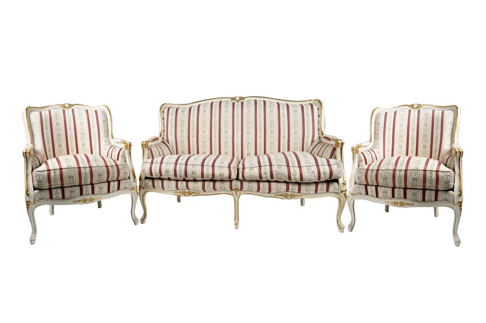 Appraisal: PAINTED PARCEL GILT SALON SETcomprising a settee and a pair