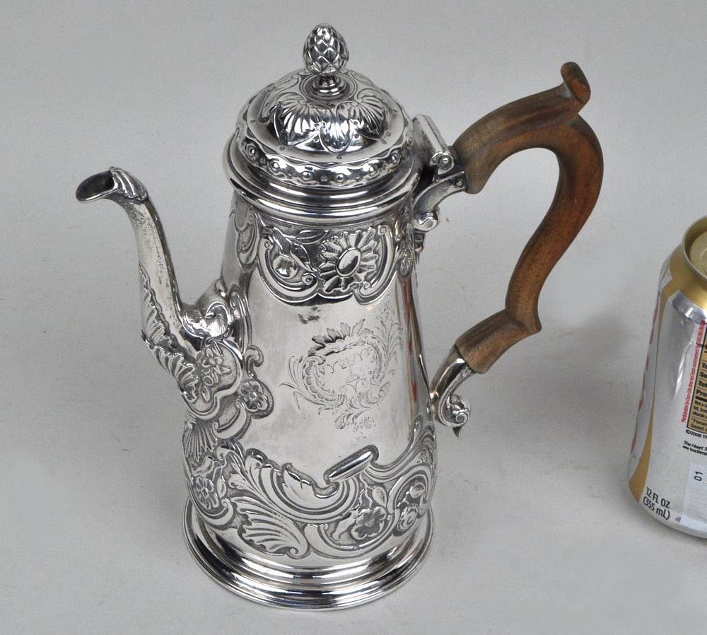 Appraisal: Georgian Sterling Coffee Pot of pear shape with floral repousse