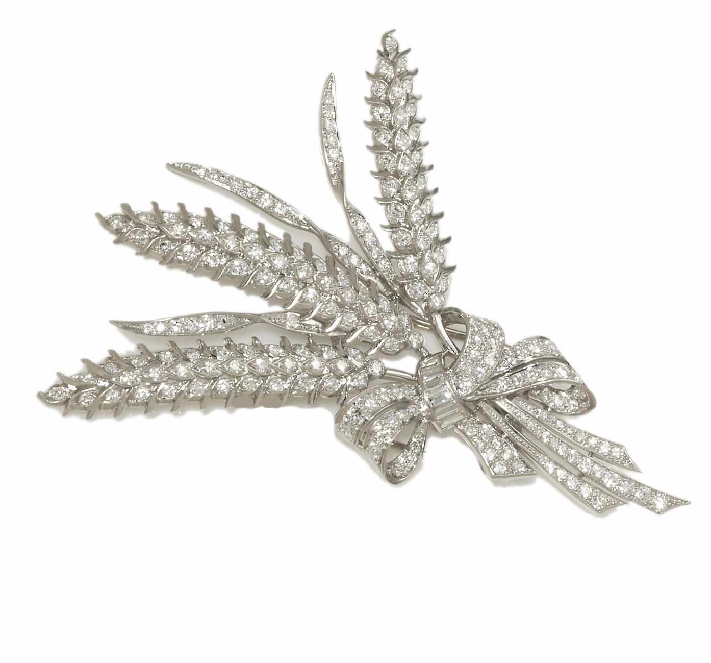 Appraisal: A diamond sheaf of wheat clip brooch estimated total diamond