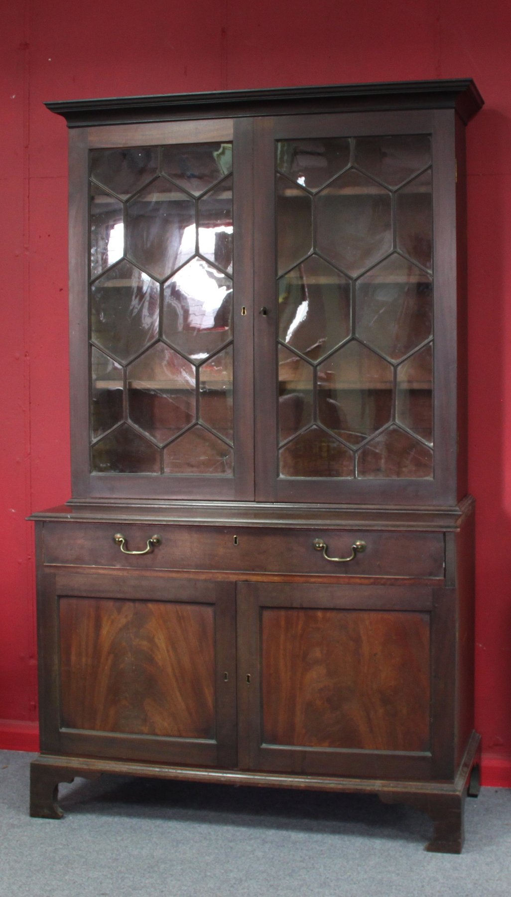 Appraisal: A George III mahogany secretaire bookcase the upper section with