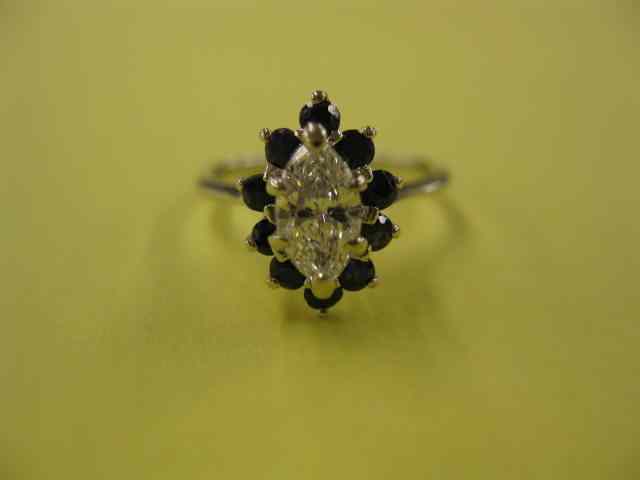 Appraisal: Diamond Sapphire Ring carat marquis diamond scarce E color and