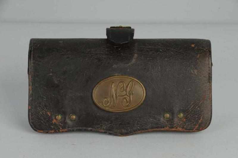 Appraisal: Leather Shell Bullet Pouch by Fraziers Description Leather pouch is