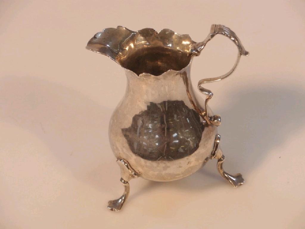 Appraisal: A George III silver baluster cream jug London probably with