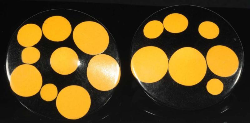 Appraisal: Bakelite Cream Black Random Dot Earrings Description Clip-ons Condition Excellent