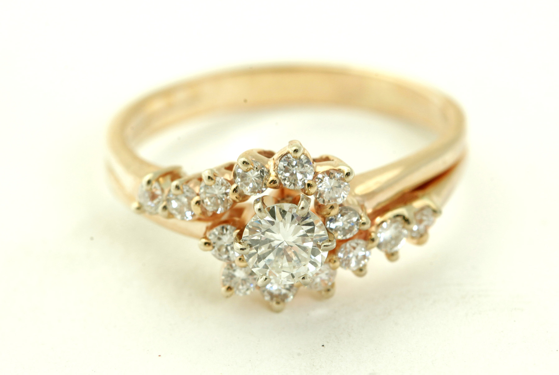 Appraisal: DIAMOND WEDDING SET American th century k yellow gold ring