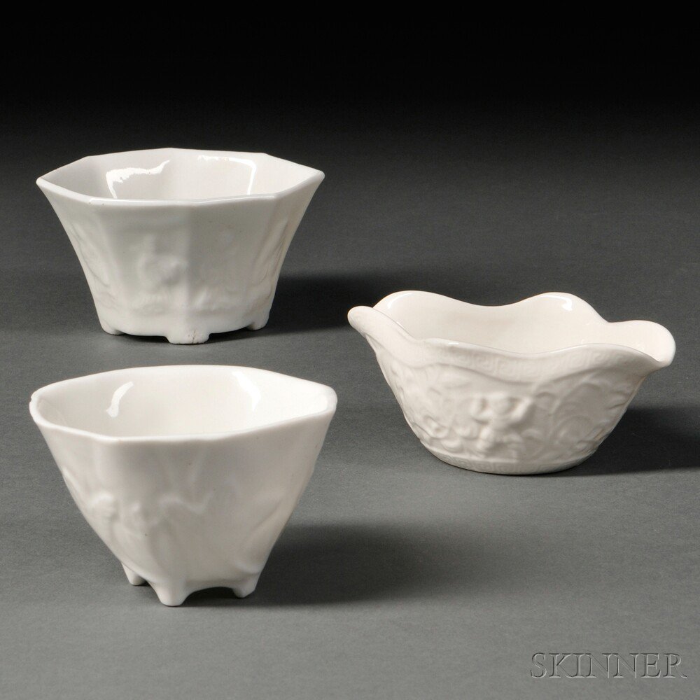 Appraisal: Three Blanc-de-Chine Cups China Qing Dynasty one hexagonal depicting the